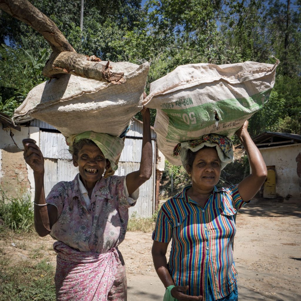 Tea pluckers always smile when seeing curious tourists are an example of the local hospitality